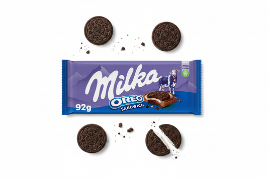 Milka OREO Sandwich 92g chocolate bar with OREO cookies scattered around