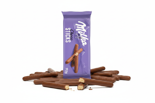 Milka Choco Sticks 112g pack with chocolate wafer sticks scattered around