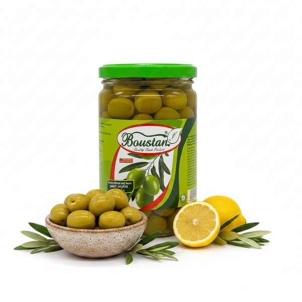Boustan Green Olives 600g – styled hero shot with olive bowl and lemon