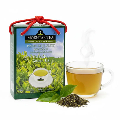 Mokhtar Tea London green tea packaging with a cup of tea, tea leaves, and a white background