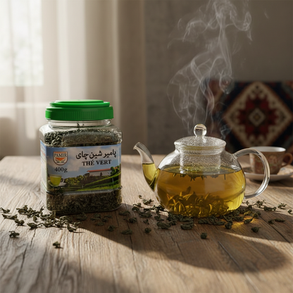 Pamir Afghan Green Tea 400g bag with loose leaves on ceramic spoon – premium loose leaf green tea Praha