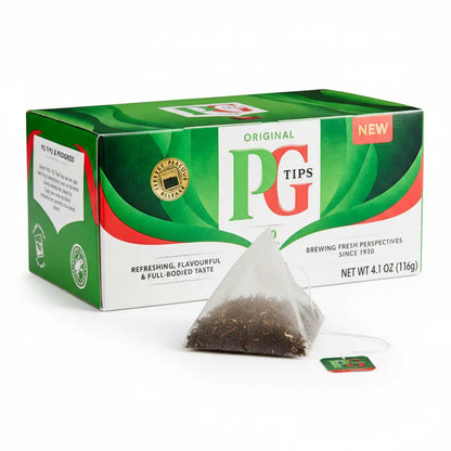PG Tips Original 40 Tea Bags flat lay with mug of black tea and milk – British tea oriental supermarket Prague