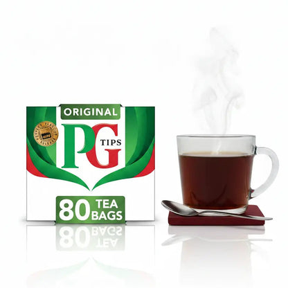 PG Tips tea box with a steaming cup of tea on a white background