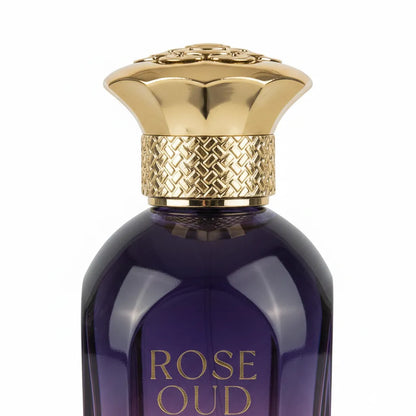 Close-up of Rose Oud Attar Cel de Parfum bottle – Brandy luxury purple gradient glass flacon detail
